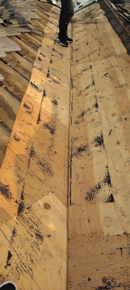 Slide of Echevarria Roofing