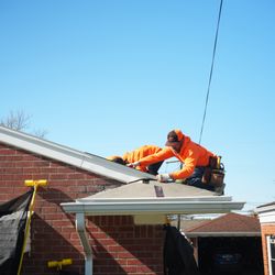 L&S Home Improvements - Installing new roof to code.