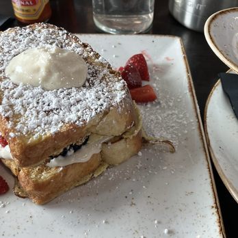 Brothers Brunch House - Stuffed Berry French Toast and side of Organic cheesy grits - Breakfast & Brunch Near Me - Burton, Michigan Brothers Brunch House - Stuffed Berry French Toast and side of Organic cheesy grits - Breakfast & Brunch Near Me - Burton, Michigan