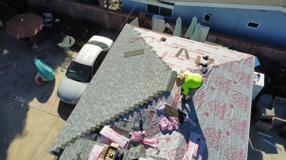 Slide of Home Town Roofing