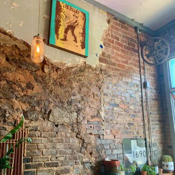 The World Famous - a brick wall in a restaurant - Music Venues Near Me - Athens, Georgia The World Famous - a brick wall in a restaurant - Music Venues Near Me - Athens, Georgia