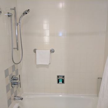The Donatello - Standard full bath. Top to turn on water, bottom for water temperature. - Hotels Near Me - San Francisco, California The Donatello - Standard full bath. Top to turn on water, bottom for water temperature. - Hotels Near Me - San Francisco, California