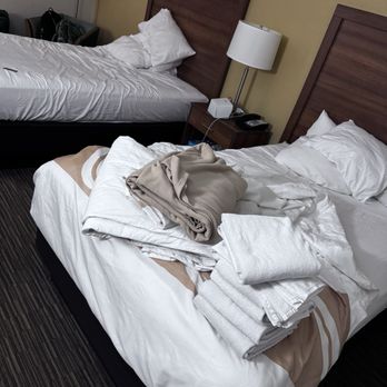 Quality Inn - How the owners wife left the bedding after us waiting all day for her to give us blankets for my son's bed.  This picture was taken at 6pm - Hotels Near Me - Berea, Kentucky
