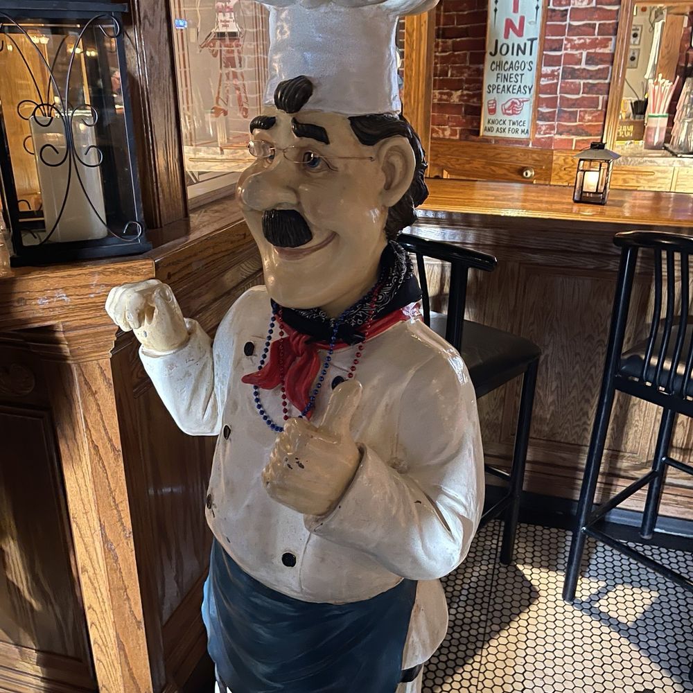 Chicago Speakeasy - A statue in the lobby. - New American Near Me - Des Moines, Iowa Chicago Speakeasy - A statue in the lobby. - New American Near Me - Des Moines, Iowa