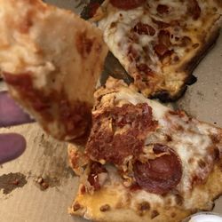 City Market - It's like they took a store-bought pizza and cooked it half the time. I wouldn't give it to my dog.