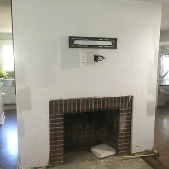 Paul Martin Services - Fireplace before it was refaced. - General Contractors Near Me