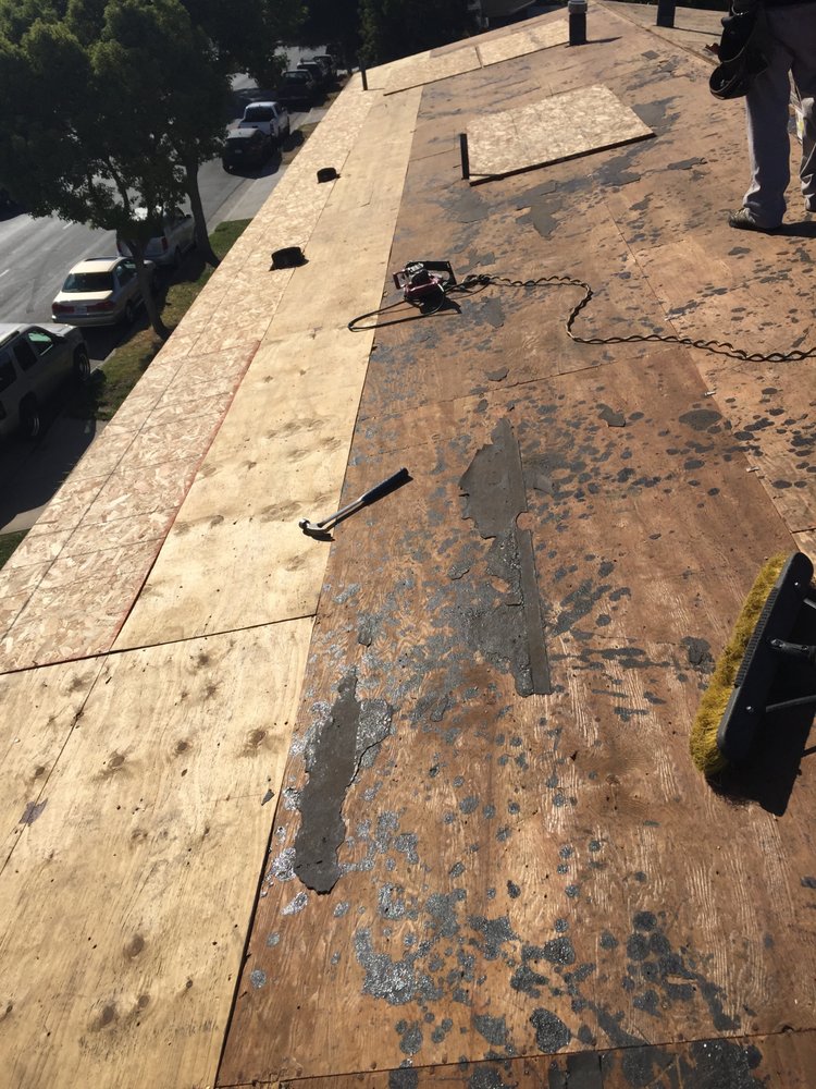 Slide of Ruiz Roofing Construction