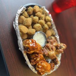 Pine Needles Country Club - 6 piece fried chicken wings with fried okra. Chicken wing flavors were sweet chili and ranch.