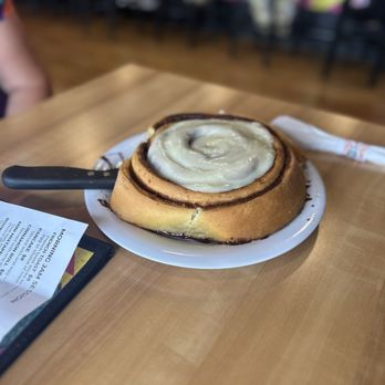 Paul's Breakfast House - 3+ pound cinnamon roll. Icing poured at the table. - Breakfast & Brunch Near Me - Branson, Missouri Paul's Breakfast House - 3+ pound cinnamon roll. Icing poured at the table. - Breakfast & Brunch Near Me - Branson, Missouri