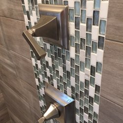 AGP Kitchen & Bath Design - Wood planks porcelain tiles in teal bathroom.