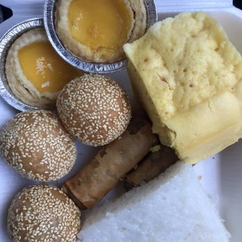 Won Kok Restaurant - Flaky Egg Tarts rating 3.5/5, sponge cake (we didn't order lol), rice cake, egg rolls w/ noodles in it? 3.5/5 rating, sesame balls - Chinese Near Me - Los Angeles, California