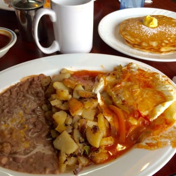 Rey's Little Kitchen - Top: chorizo and eggs with rice, beans. Bottom: Huevos Rancheros with potatoes, beans. Also: coffee and short stack (2 pancakes) - Breakfast & Brunch Near Me - Whittier, California