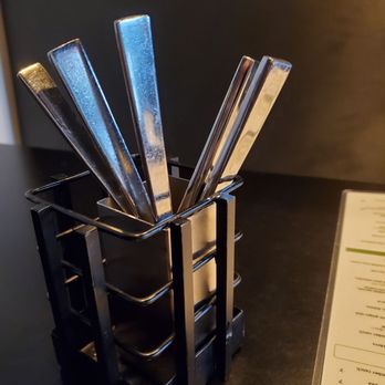 Divvy - Plenty of knives and forks to make your way through your meal - New American Near Me - Carmel, Indiana