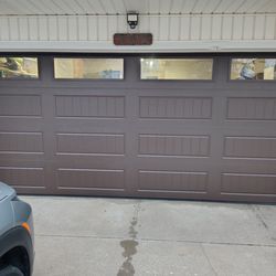 Ollies Garage Doors - Nothing like a beautiful brown show stopper to catch your community's attention!