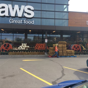 Loblaws - a storefront with hay bales and pumpkins - Grocery Near Me - Ottawa, Ontario