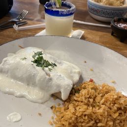 Chicken enchiladas with cilantro cream sauce (beans missing because I'm allergic) Chicken enchiladas with cilantro cream sauce (beans missing because I'm allergic)