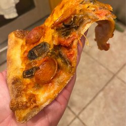 Three Brothers Pizza - Palm Harbor - Floppy pepperoni & mushroom slice. Also don't know why it's orange?