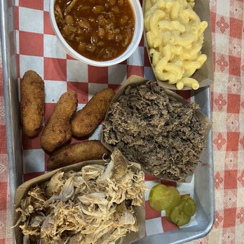 Phil's Bar-B-Que Pit - Two meat plate: chopped brisket, chopped chicken, baked beans, macaroni and cheese, hush puppies - Barbeque Near Me - Black Mountain, North Carolina Phil's Bar-B-Que Pit - Two meat plate: chopped brisket, chopped chicken, baked beans, macaroni and cheese, hush puppies - Barbeque Near Me - Black Mountain, North Carolina