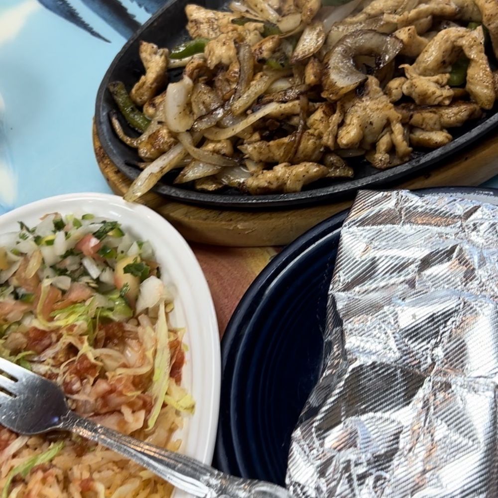 El Torero Mexican Restaurant & Grill - Sizzling chicken fajitas - Mexican Near Me - Flowood, Mississippi