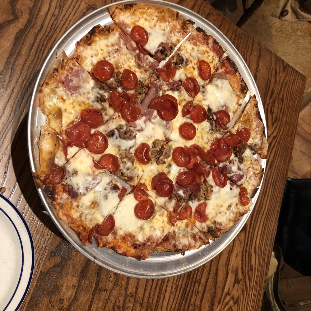 Eno's Pizza Tavern - Pig Smiley Pizza - Pizza Near Me - Forney, Texas