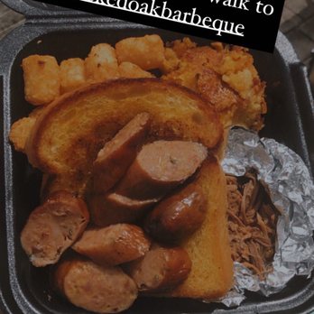 Wicked Oak Barbeque - Pulled pork and jalapeño cheddar sausage with tater tots and hogs feed. - Barbeque Near Me - Tampa, Florida Wicked Oak Barbeque - Pulled pork and jalapeño cheddar sausage with tater tots and hogs feed. - Barbeque Near Me - Tampa, Florida