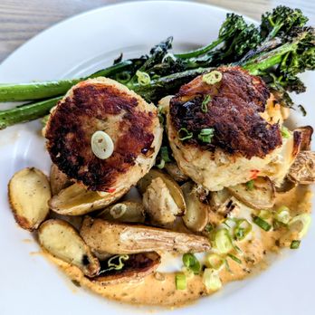 Blu Point Seafood Co - Crab Cakes served with potatoes and broccolini with a modest bit of remoulade. Excellent. - Seafood Near Me - Staunton, Virginia