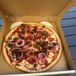 Pizza My Heart - Gluten free, vegan cheese pizza with pepperoni, olives, and red onions