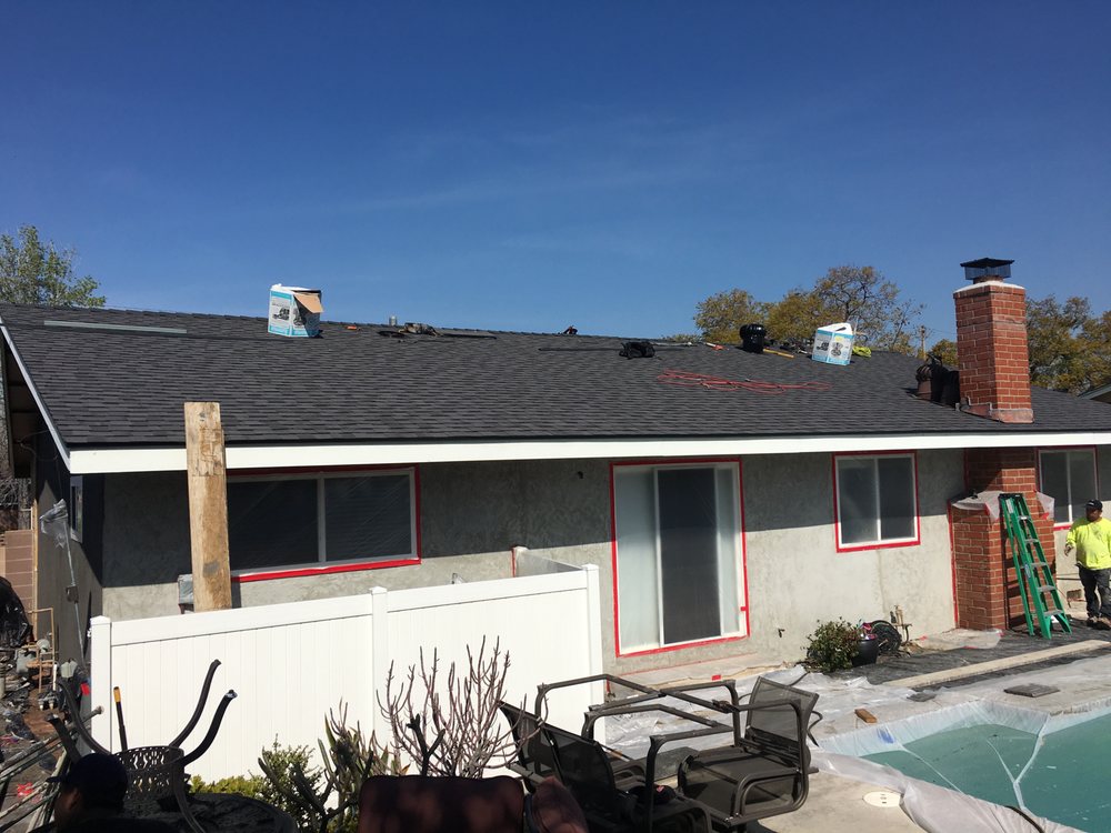 Slide of Tom Byer Roofing Service