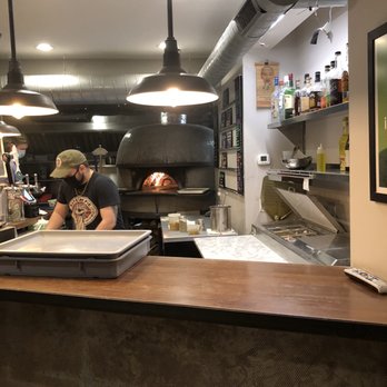 Citizen Pie - a man working in a commercial kitchen - Pizza Near Me - Cleveland, Ohio Citizen Pie - a man working in a commercial kitchen - Pizza Near Me - Cleveland, Ohio