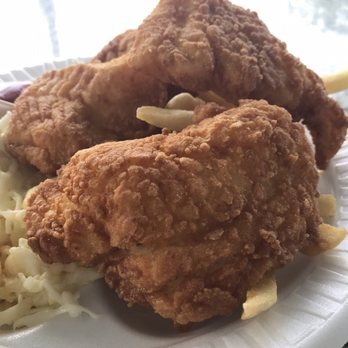 Santorini - $ large pieces of Fish served on the Fish and Chips Plate - Seafood Near Me - Revere, Massachusetts