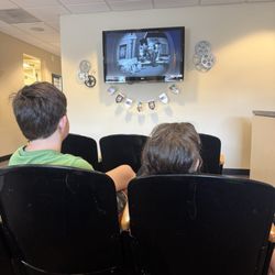 Hollywood Children's Dentistry - Kids movie playing in the lobby