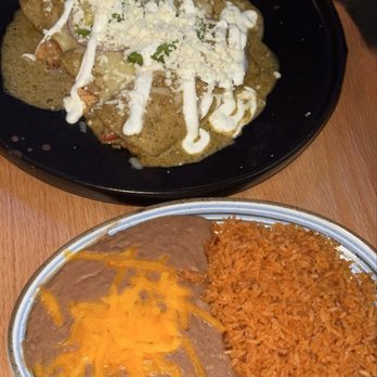 Fuego Mexican Grill - Lobster Enchiladas with a side of rice and beans added on. - Tacos Near Me - Cromwell, Connecticut Fuego Mexican Grill - Lobster Enchiladas with a side of rice and beans added on. - Tacos Near Me - Cromwell, Connecticut