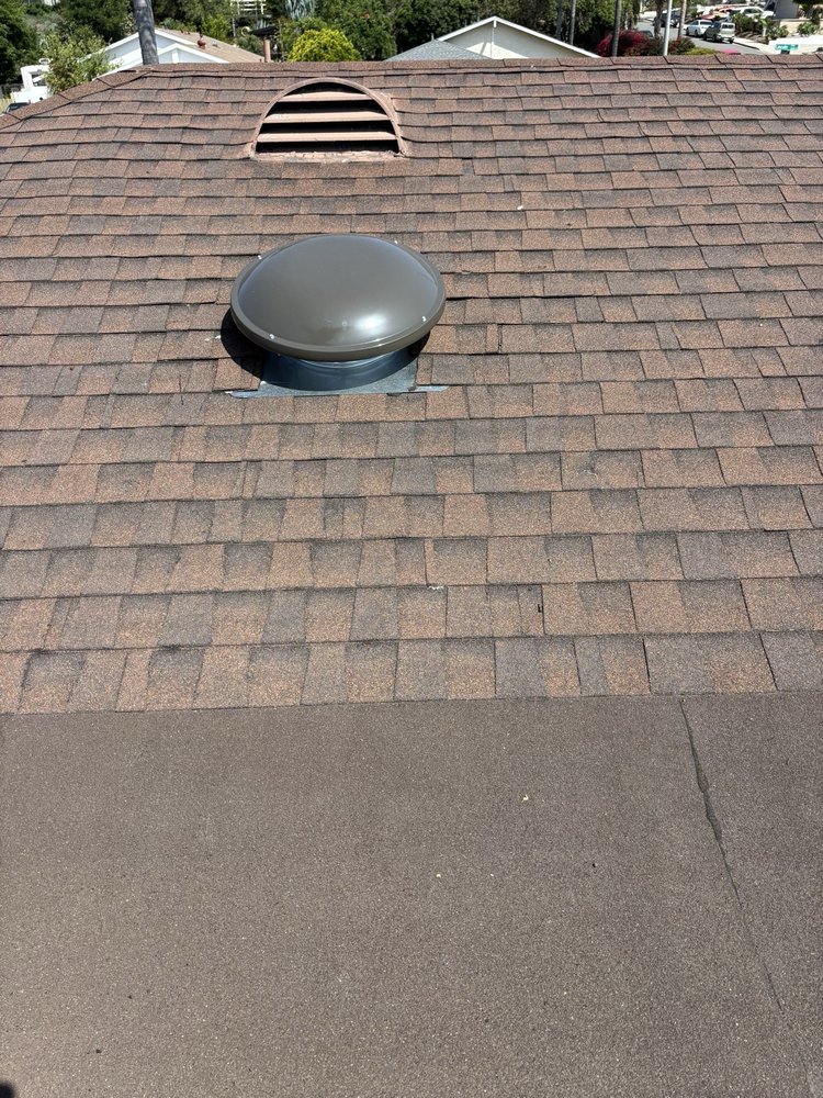 Slide of Vigil's Roofing