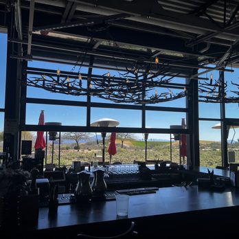 Raven's View - Views out to the patio from the Bar - Pubs Near Me - Cave Creek, Arizona Raven's View - Views out to the patio from the Bar - Pubs Near Me - Cave Creek, Arizona