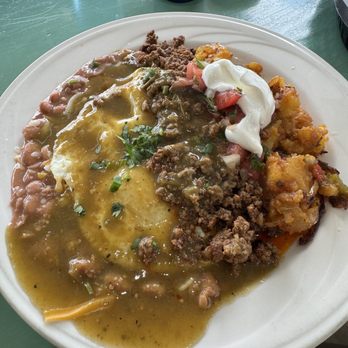Nopalitos - Chilaquiles in salsa verde with house chorizo. - Mexican Near Me - Sacramento, California