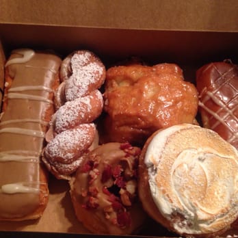 Dutch Monkey Doughnuts - We loved these donuts! Apple fritter, Nutella, lemon meringue, salted Carmel, maple bacon, and maple donuts! - Donuts Near Me - Cumming, Georgia