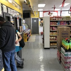 Ensenada Markets - Check cashing area in rear of store.