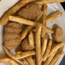 taco el paloma - My son's Chicken nuggets and fries.