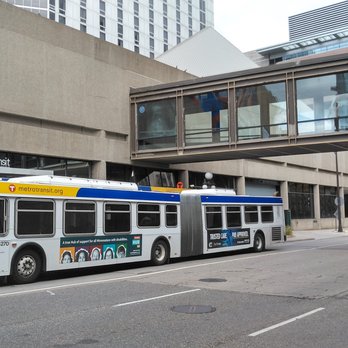 Metro Transit - Buses augment the Metro system. Here, one is at a stop under one of the many skybridges in St. Paul. - Public Transportation Near Me - Minneapolis, Minnesota Metro Transit - Buses augment the Metro system. Here, one is at a stop under one of the many skybridges in St. Paul. - Public Transportation Near Me - Minneapolis, Minnesota