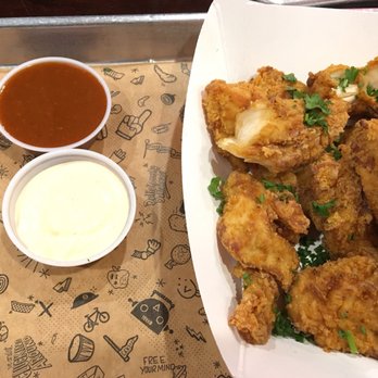 Sticky's - Medium - 12 Chicken Poppers (sauce: Sticky's Sauce and honey bbq) - Fast Food Near Me - New York, New York Sticky's - Medium - 12 Chicken Poppers (sauce: Sticky's Sauce and honey bbq) - Fast Food Near Me - New York, New York