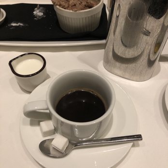 Alexander's Steakhouse - Pasadena - French press be chocolate soufflé in the background - Steakhouses Near Me - Pasadena, California