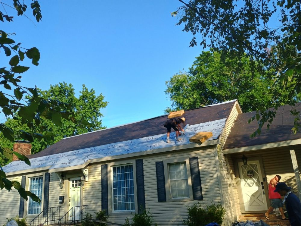 Slide of Peak Roofing Solutions