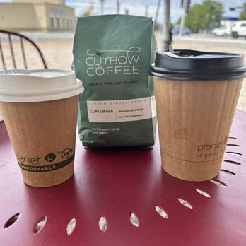 Cutbow Coffee Roastology - Sitting outside with my Cortado, bag of Guatemala coffee and a cup of Guatemala drip! - Coffee Roasteries Near Me - Albuquerque, New Mexico