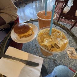 Dripolator Coffeehouse - Golden knight latte, sausage egg and cheese, mango smoothie.