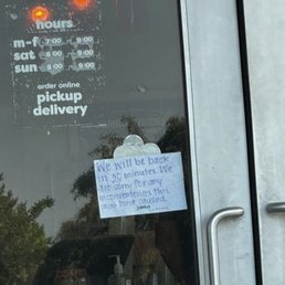 Sign saying closed, but still open and inside making smoothies.