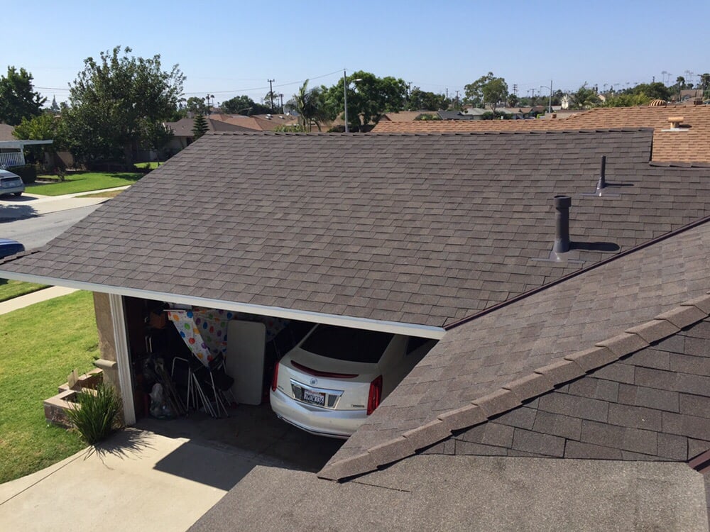 Slide of H&M ROOFING