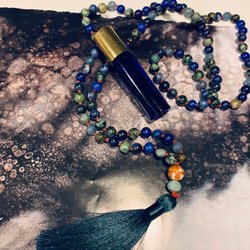 Violet Hive Art Collective - Mala and Essential Oil Studio African Turquoise, Lapsis, and Sodalite. Grounding essential oil with Bergamot, Lavender, Rose, Sandalwood...