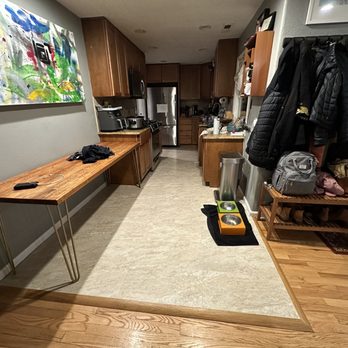 Pro Interior Design - New LVP flooring and oak reducer - Tiling Near Me