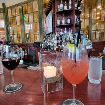 Velvet Buffalo Modern Italian - Strawberry mojito and glass of wine at the bar - Wine Bars Near Me - Beloit, Wisconsin