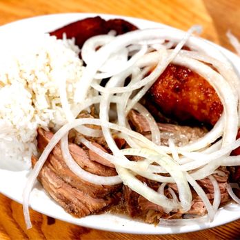 Versailles - a plate of meat, rice, and vegetables - Cuban Near Me - Encino, California Versailles - a plate of meat, rice, and vegetables - Cuban Near Me - Encino, California